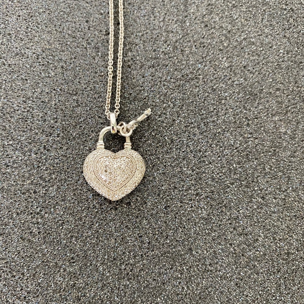 White gold, diamond heart with key necklace.